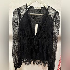 Vici lace detail top with adjustable tie in the front